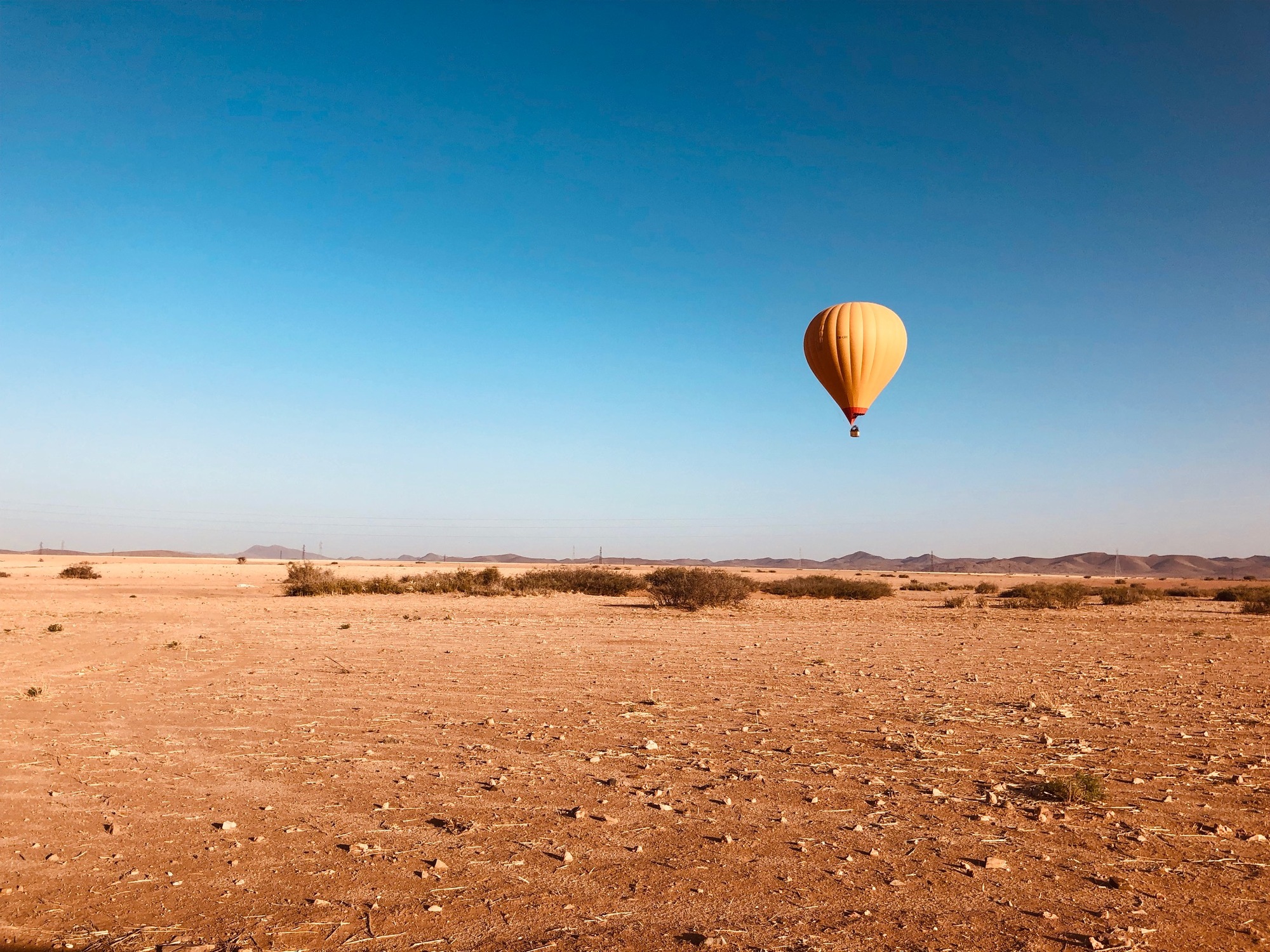 Professioneel uitgevoerde ballonvaarten boven de woestijn van Marrakech – Een onvergetelijke ballonvaart bij zonsopgang boven de savanne woestijn, incl. ontbijt en Transport heen/terug vanuit jouw accommodatie! – Marrakech